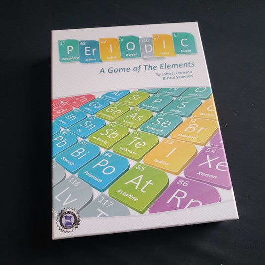 Image shows the front cover of the box of the Periodic board game