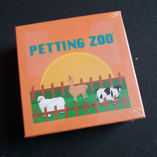 Image shows the front cover of the box of the Petting Zoo card game