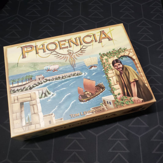 Image shows the front cover of the box of the Phoenicia board game