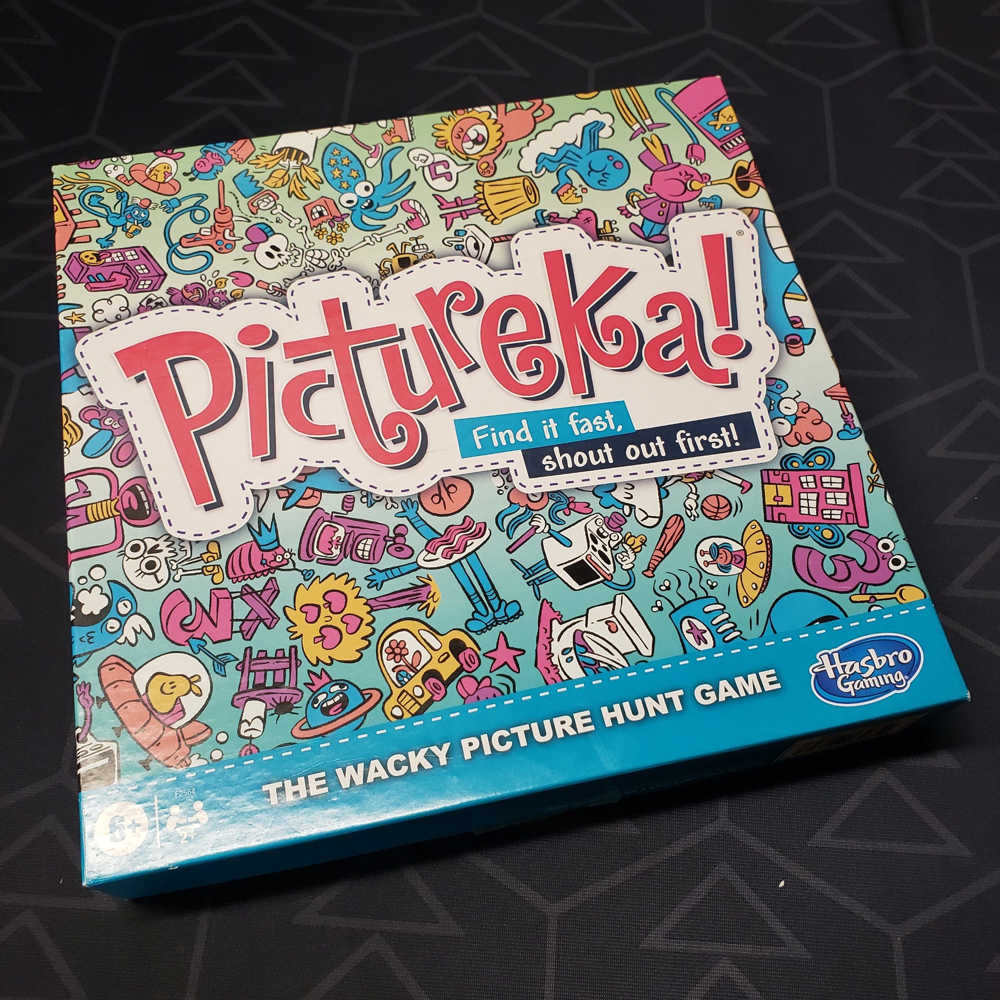 Image shows the front cover of the box for the Pictureka! board game