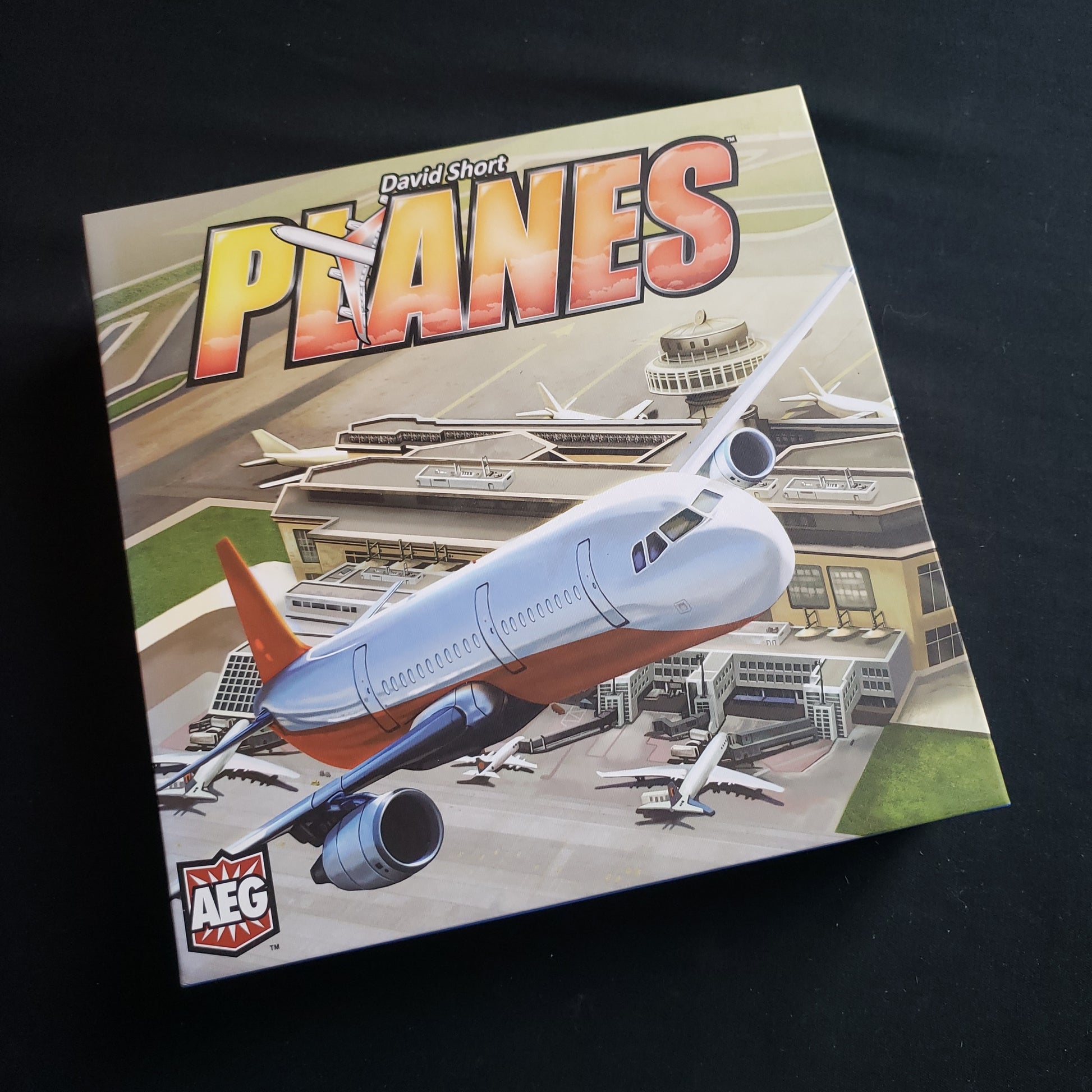 Image shows the front cover of the box of the Planes board game