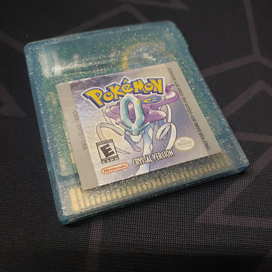 Image shows the front of the cartridge for the video game Pokemon Crystal for Nintendo Game Boy Color