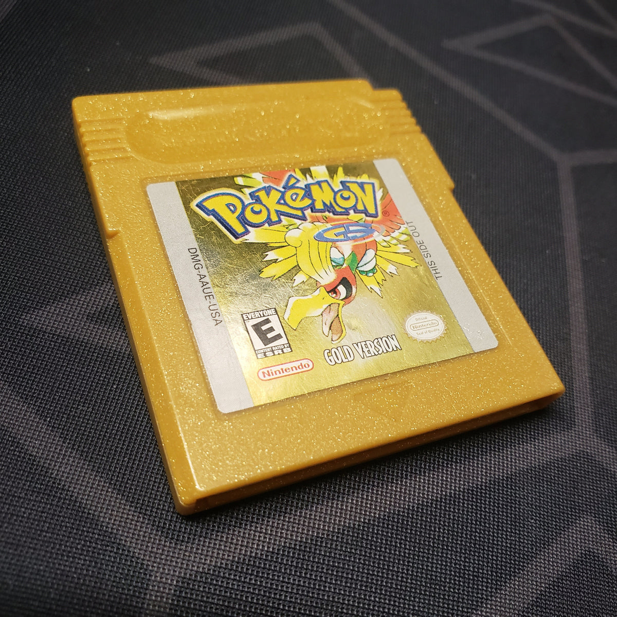 Image shows the front of the cartridge for the video game Pokemon Gold for Nintendo Game Boy Color