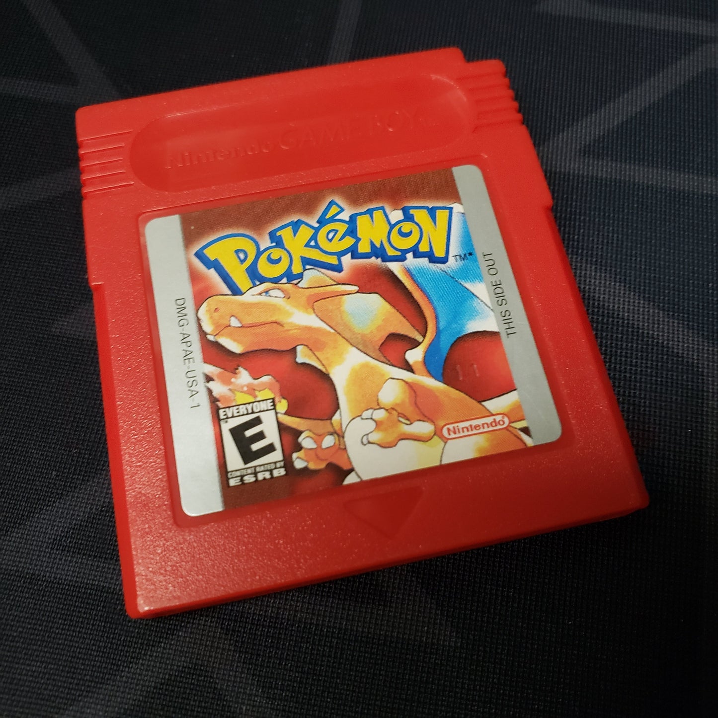 Image shows the outside of the cartridge for the game Pokemon Red for Nintendo Game Boy