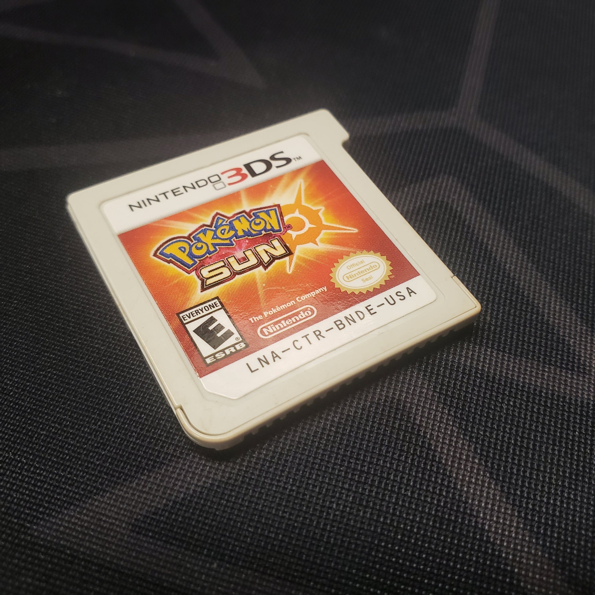 Image shows the front of the cartridge for the video game Pokemon Sun for Nintendo 3DS