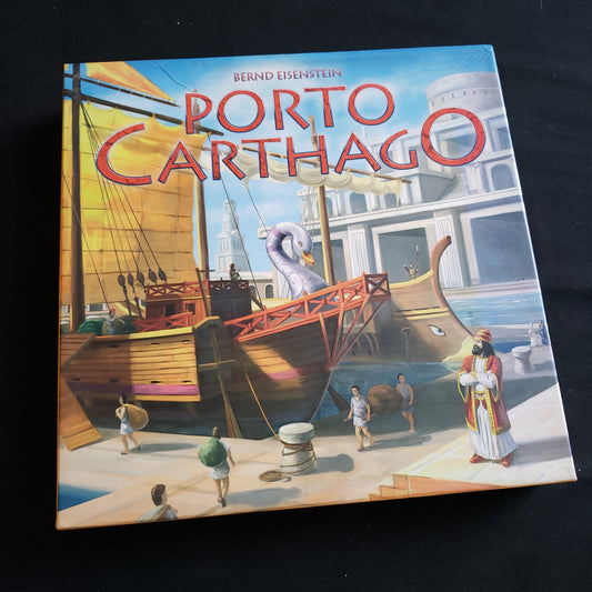 Image shows the front cover of the box of the Porto Carthago board game