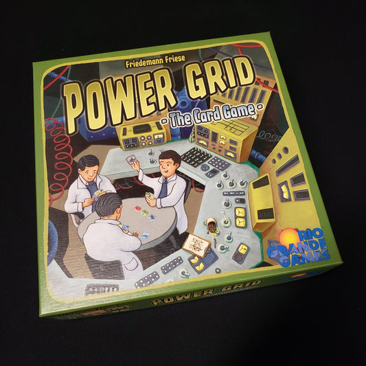 Image shows the front cover of the box of Power Grid: The Card Game