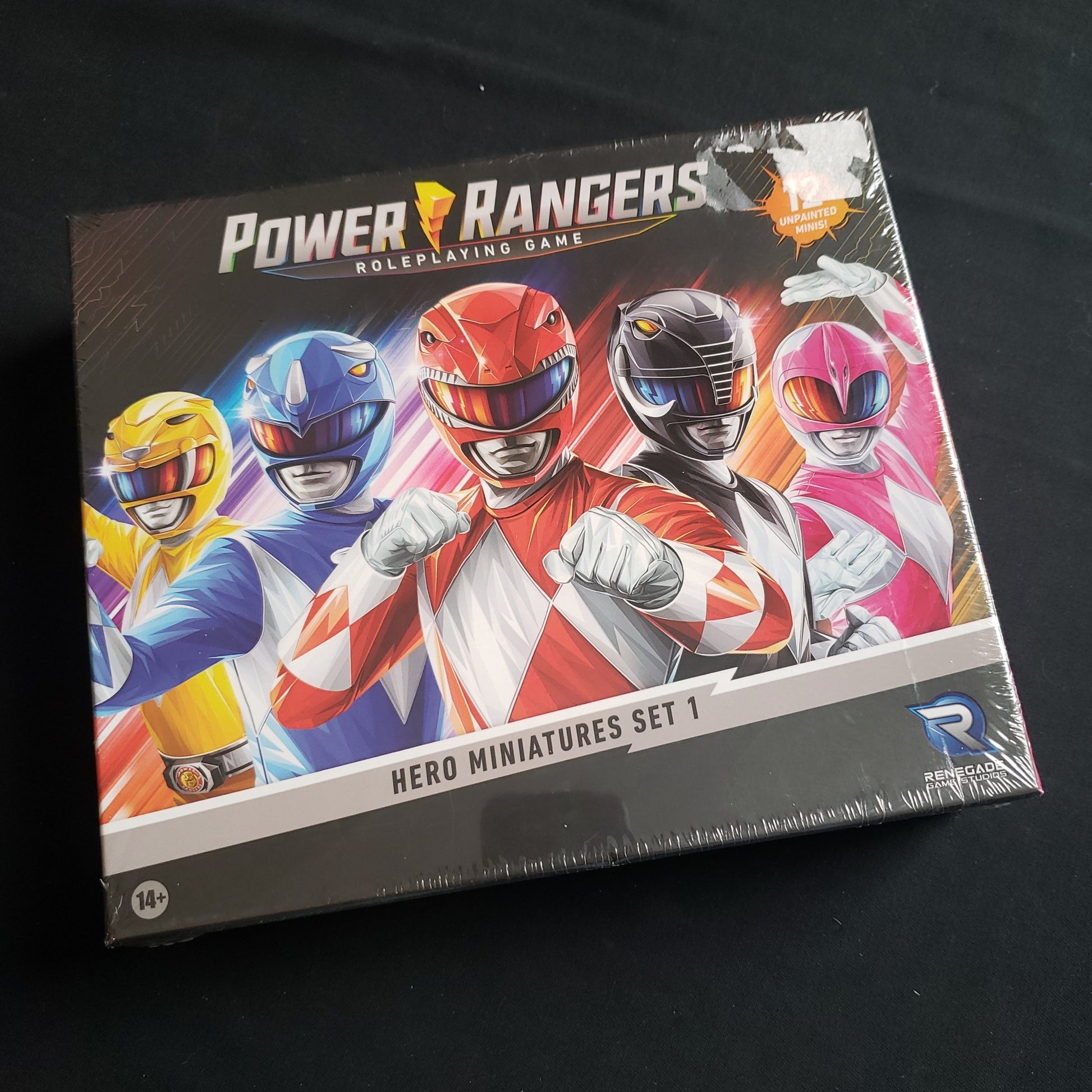 Image shows the front cover of the box of the Hero Miniatures Set 1 for the Power Rangers roleplaying  game