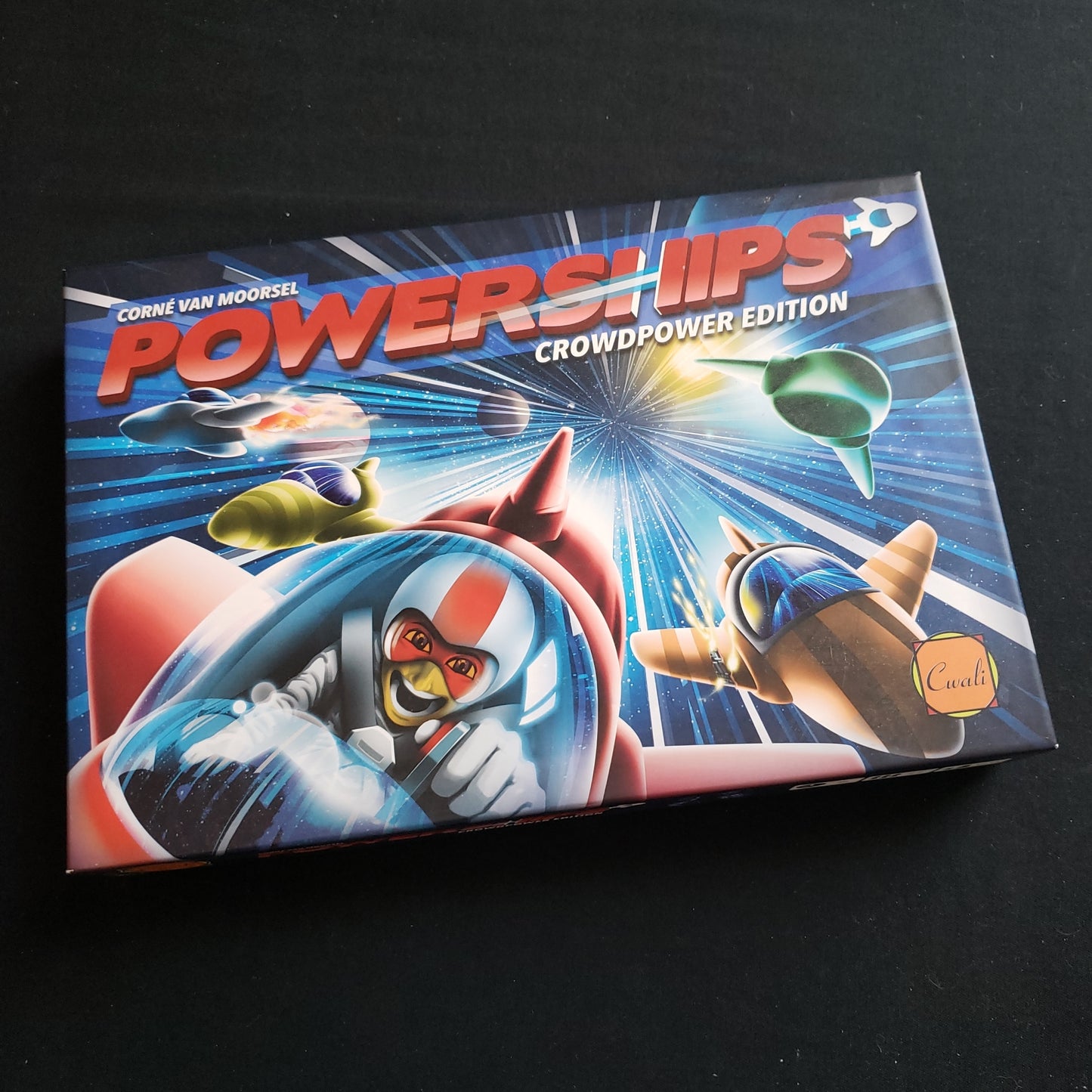 Image shows the front cover of the box of the Powerships board game