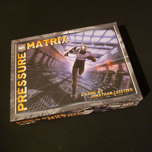 Image shows the front cover of the box of the Pressure Matrix board game