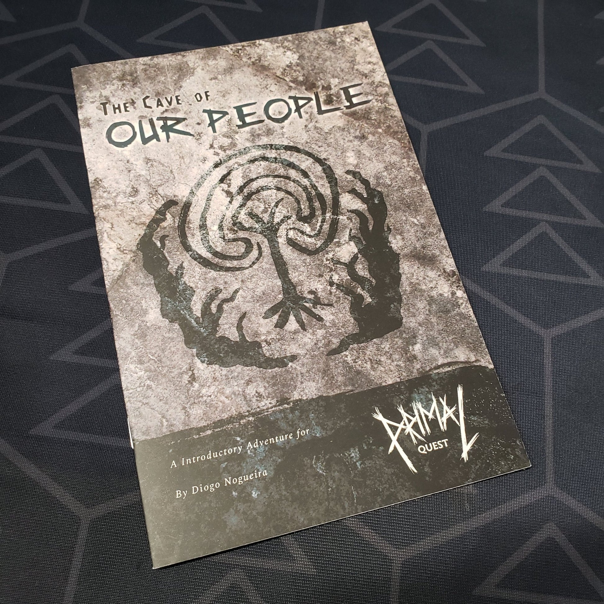 Image shows the front cover of the Cave of Our People book for the roleplaying game Primal Quest