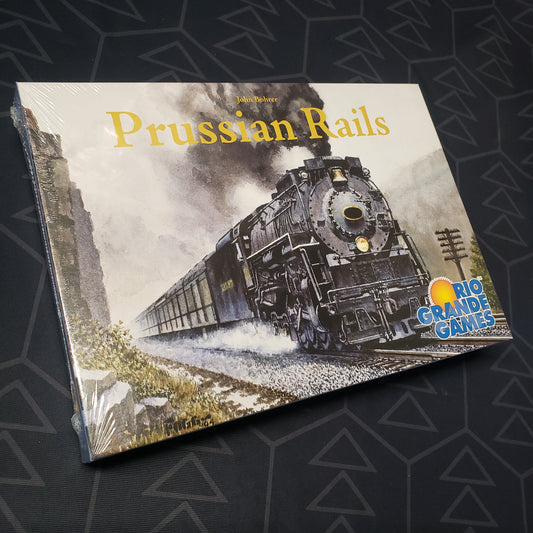 Image shows the front cover of the box for the Prussian Rails board game