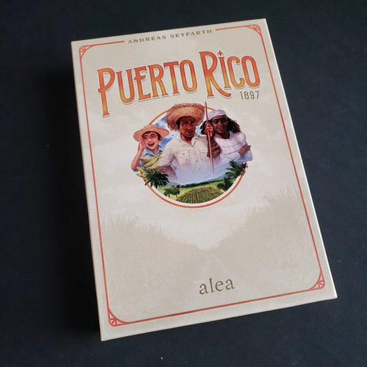 Image shows the front cover of the box of the Puerto Rico 1897 board game