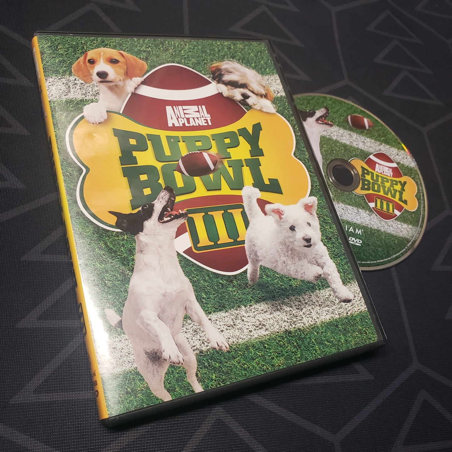 Image shows the case & disc for the live event Puppy Bowl III on DVD