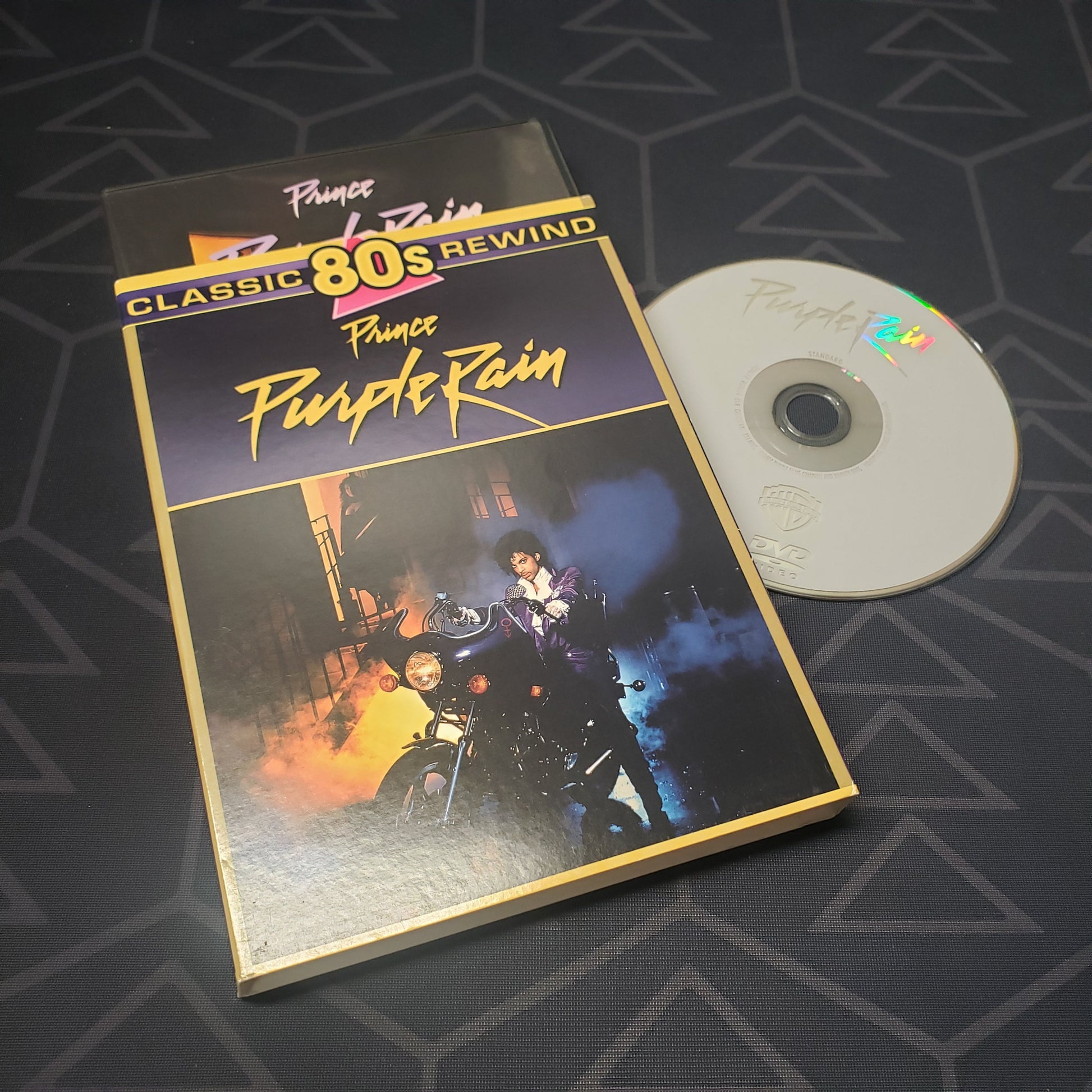 Image shows the case, slipcover & disc for the movie Purple Rain on DVD