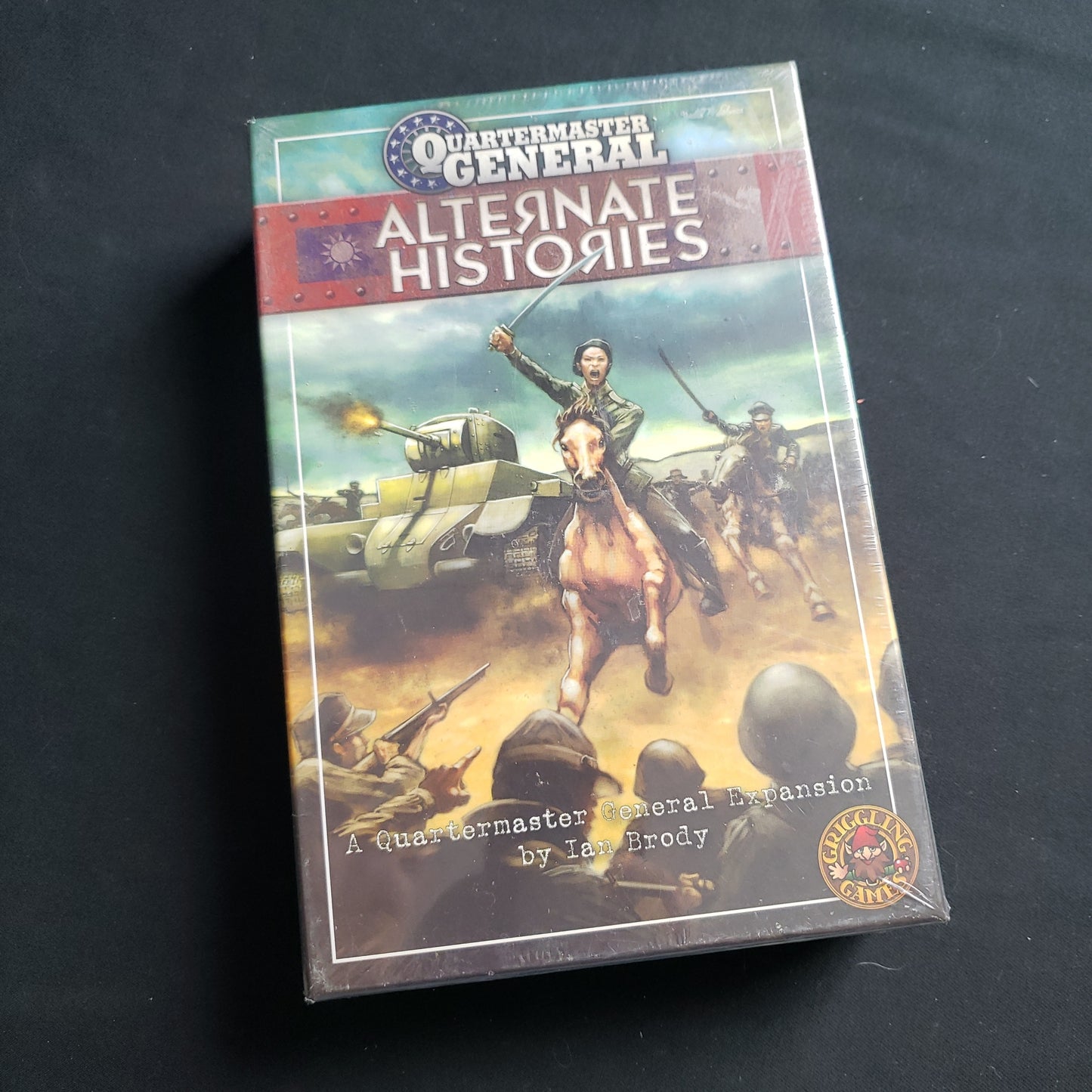 Image shows the front cover of the box of the Alternate Histories expansion for the Quartermaster General board game