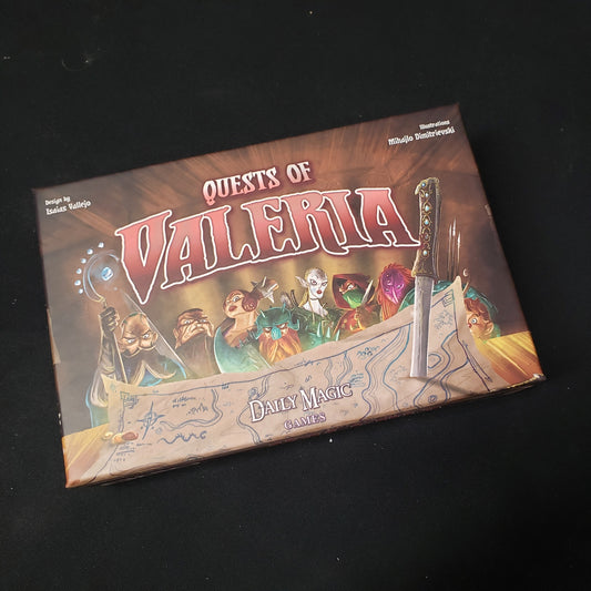 Image shows the front cover of the box of the Quests of Valeria card game