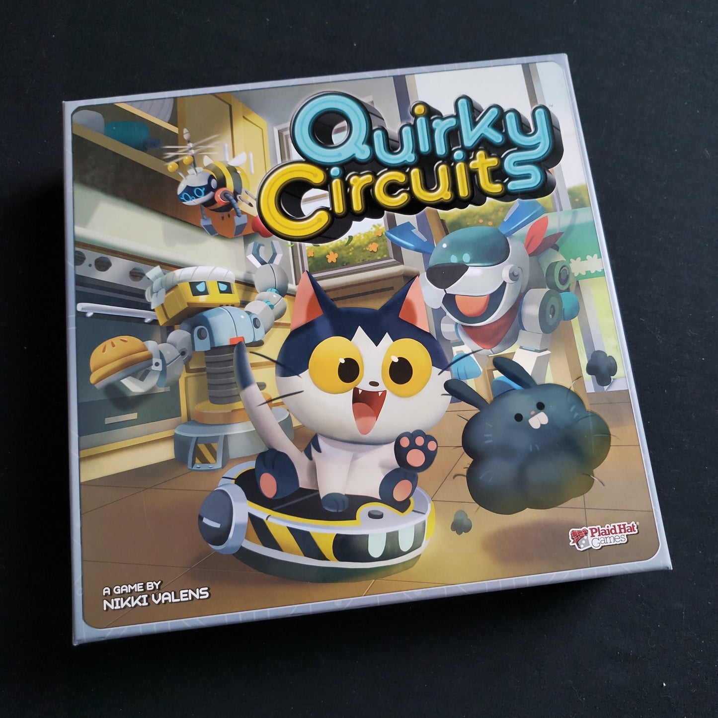 Image shows the front cover of the box of the Quirky Circuits board game