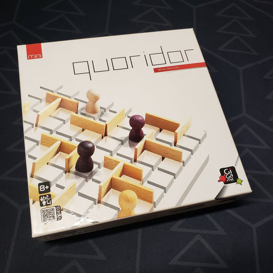 Image shows the front cover of the box for the Quoridor Mini board game