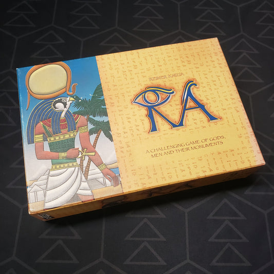 Image shows the front cover of the box for the 2005 Uberplay Printing of the board game RA