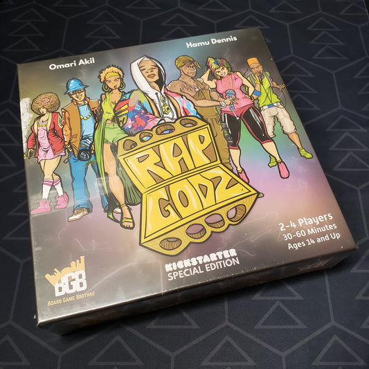 Image shows the front cover of the box for the board game Rap Godz (Kickstarter Special Edition)