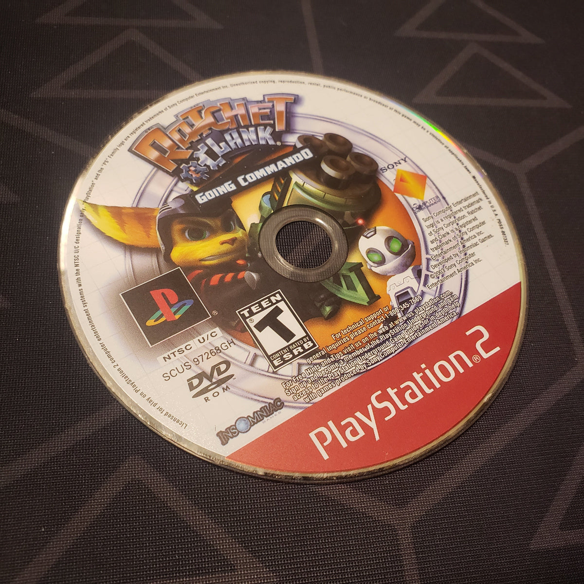 Image shows the label side of the game disc for the video game Ratchet & Clank: Going Commando for Playstation 2