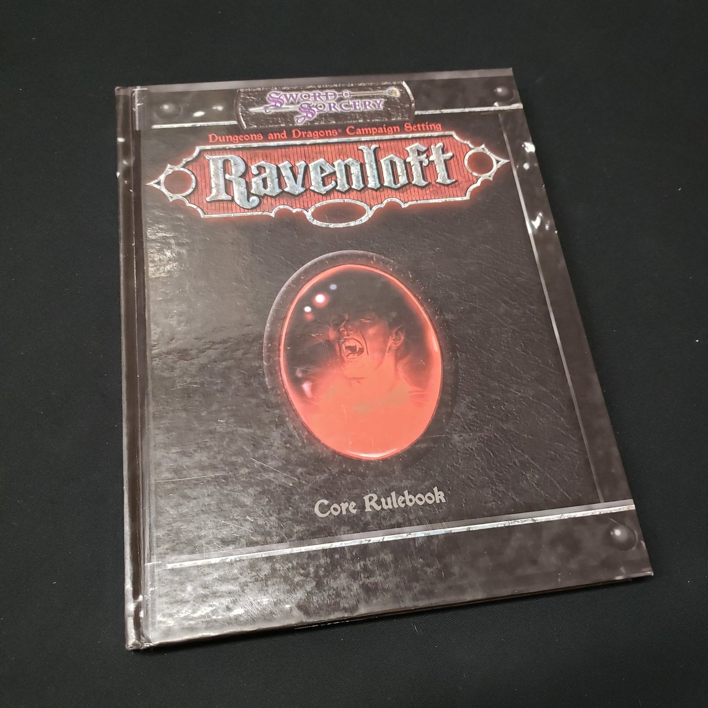 Image shows the front cover of the Ravenloft Core Rulebook roleplaying game book