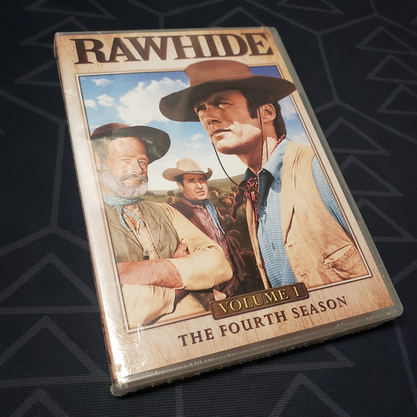 Image shows the front of the case for the first volume of the fourth season of Rawhide on DVD