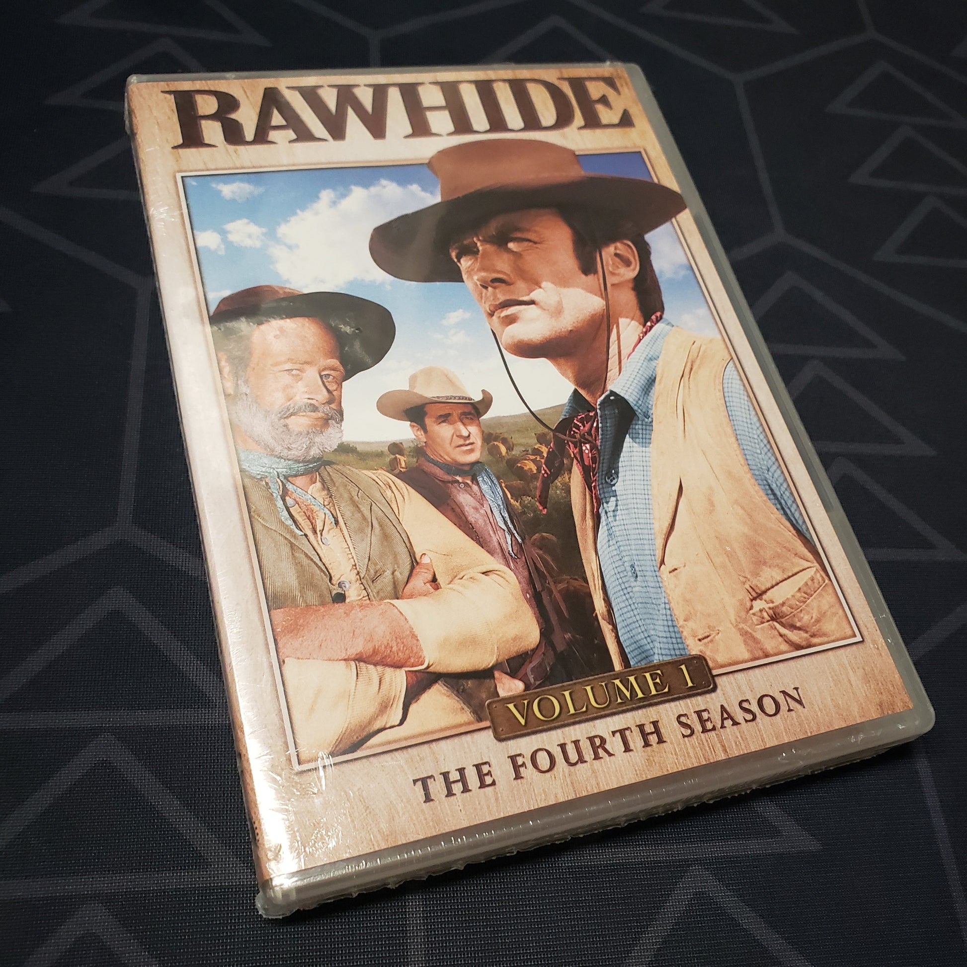 Image shows the front of the case for the first volume of the fourth season of Rawhide on DVD