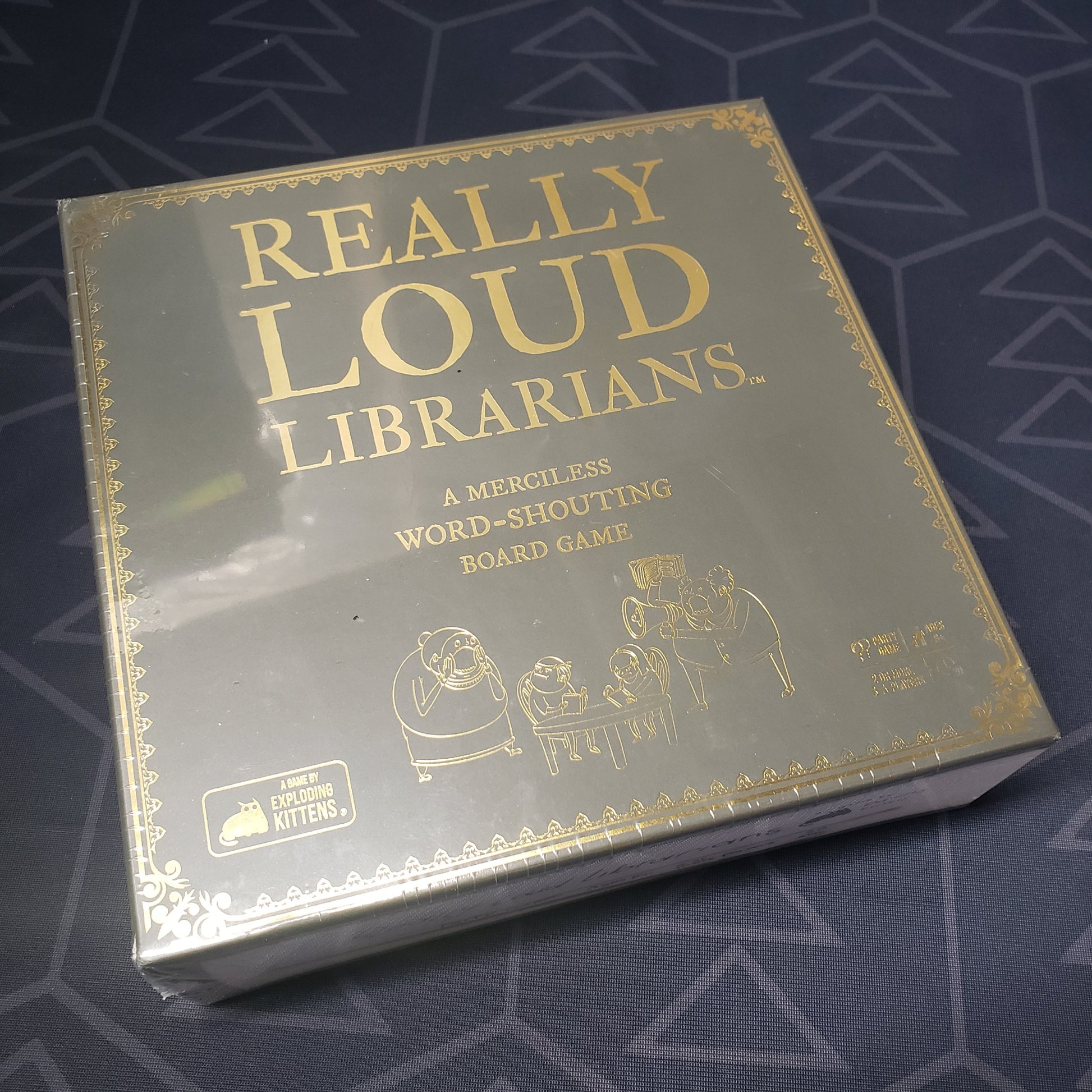 Image shows the front cover of the box of the Really Loud Librarians board game