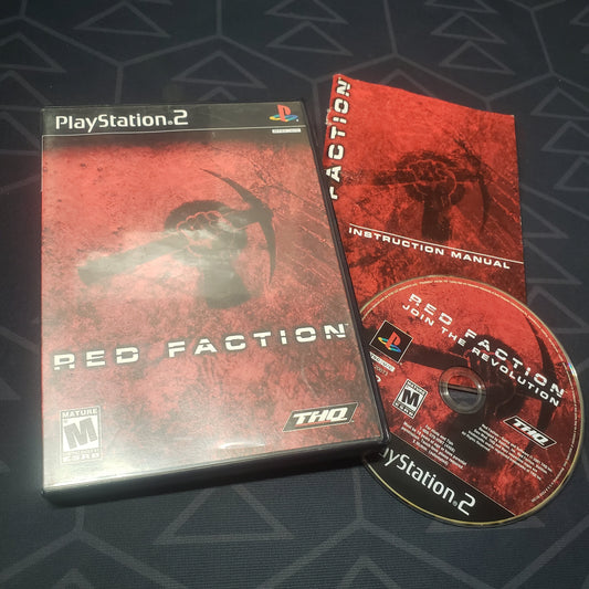 Image shows the case, manual and disc for the video game Red Faction for Playstation 2