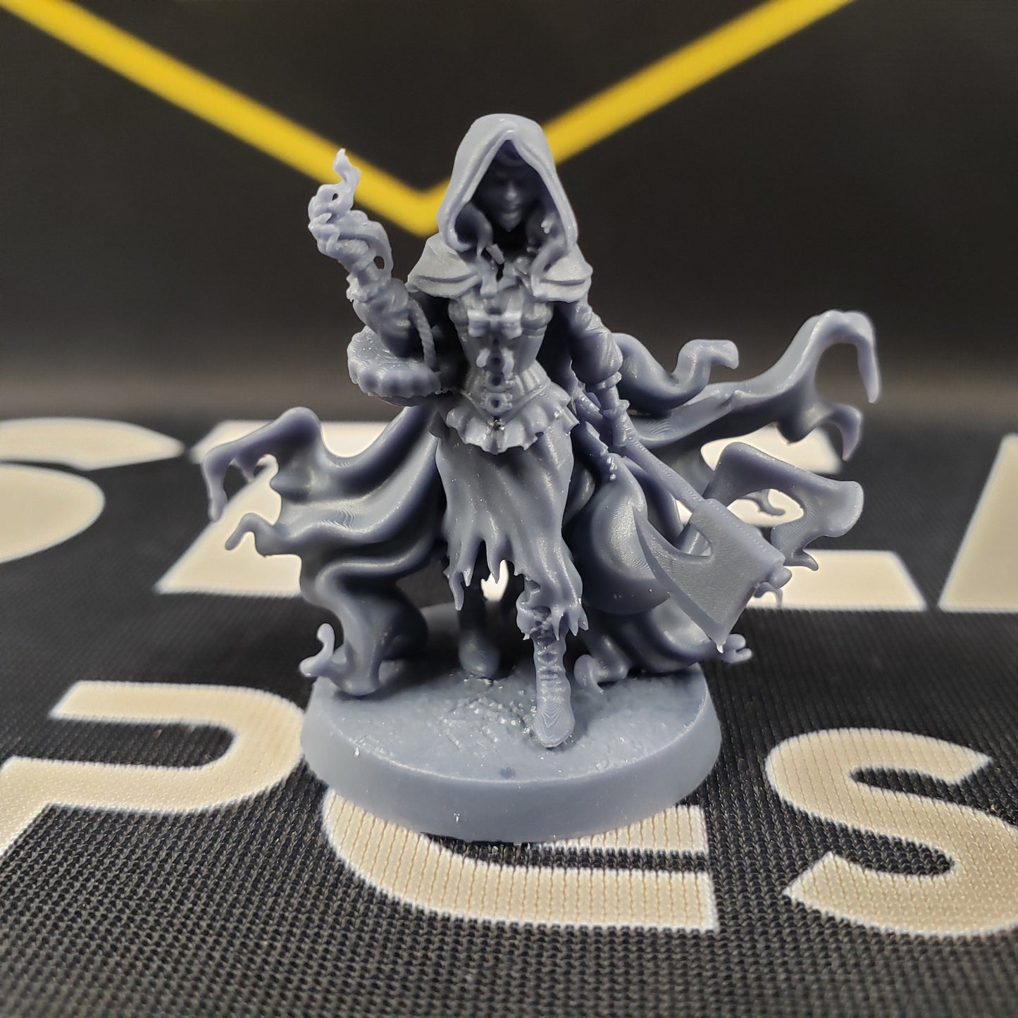 Image shows the front of a vampire fighter gaming miniature.
