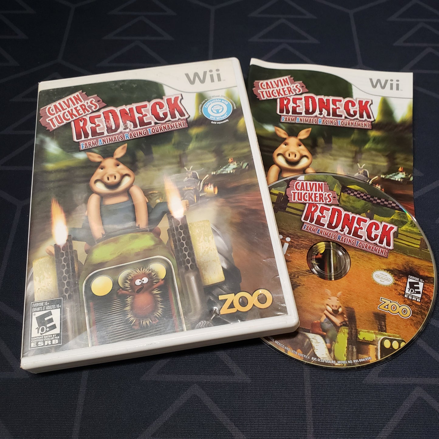 Image shows the case, manual & disc for the video game Redneck Farm Animals Racing Tournament for Nintendo Wii