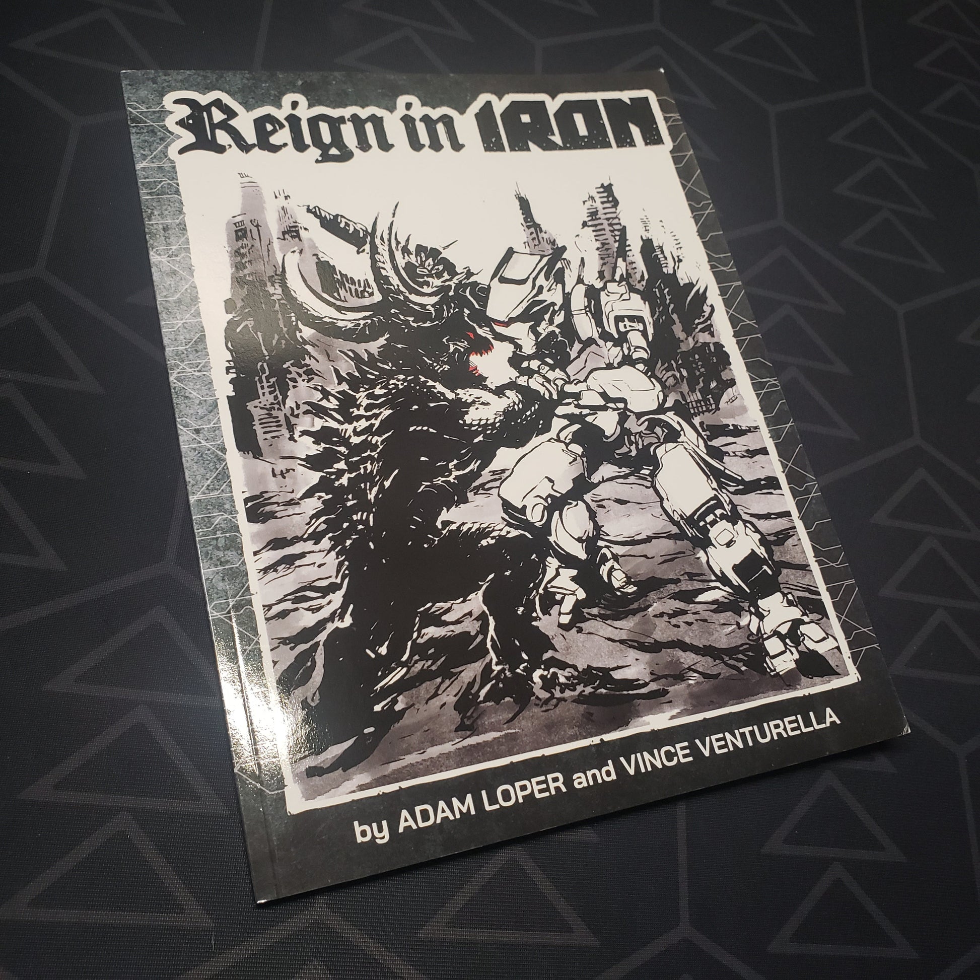 Image shows the front cover of the Reign in Iron wargaming book