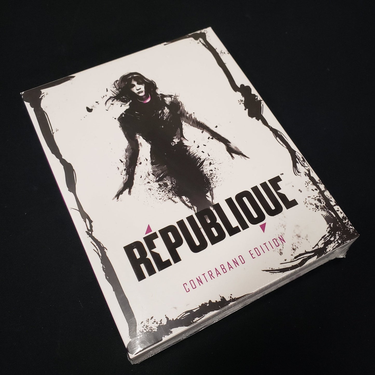 Image shows the front of the packaging for the video game Republique: Contraband Edition for Playstation 4