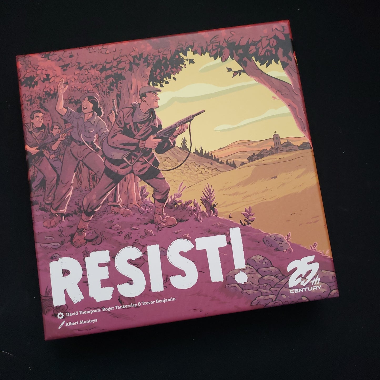 Image shows the front cover of the box of the Resist! board game