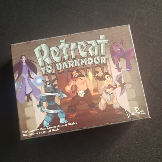 Image shows the front cover of the box of the Retreat to Darkmoor card game