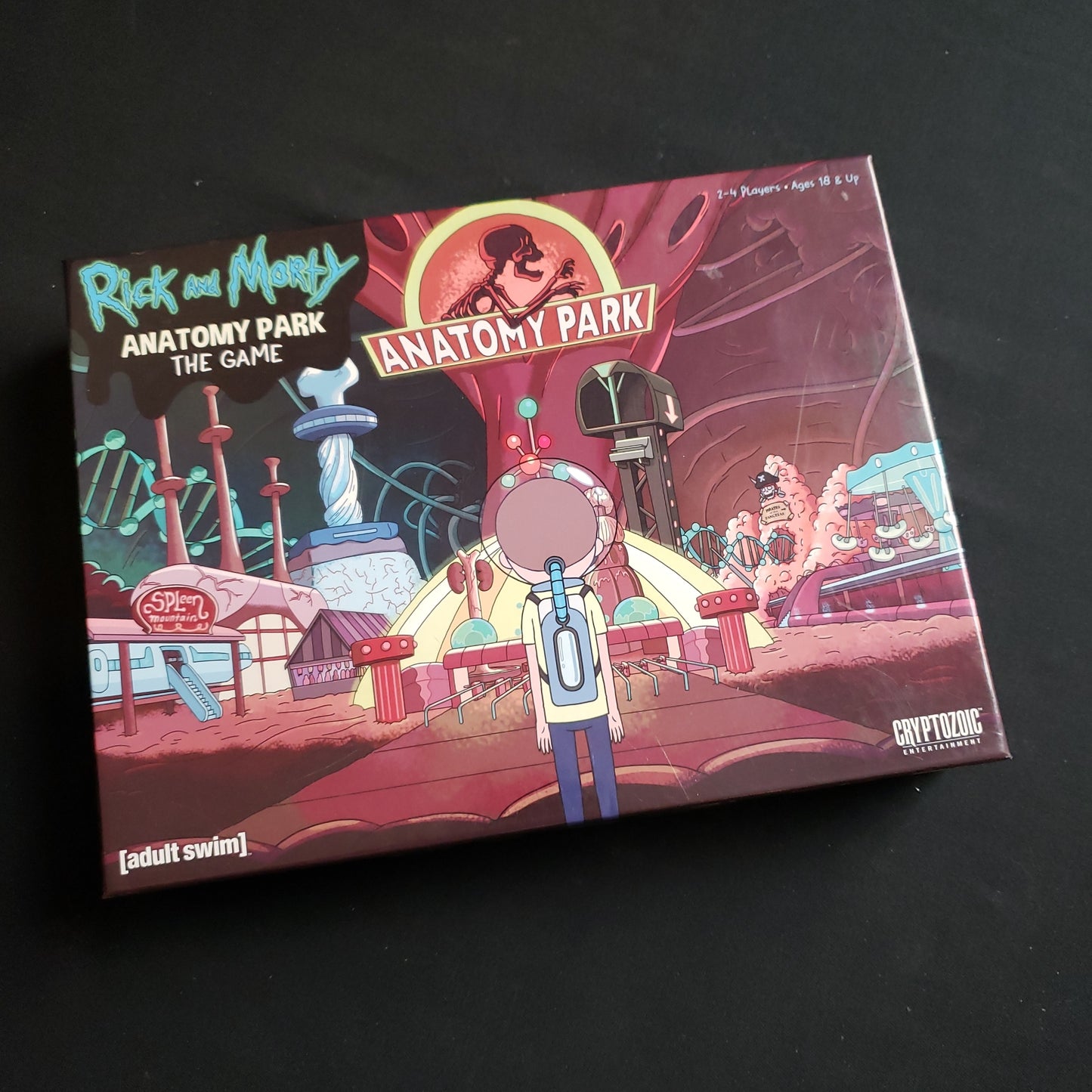 Image shows the front cover of the box of the Rick & Morty: Anatomy Park board game