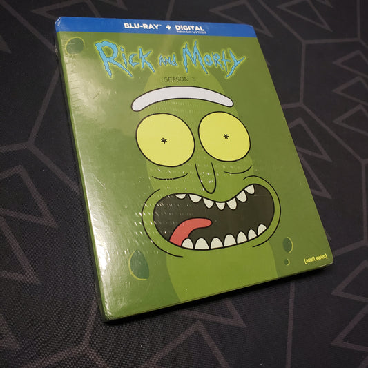 Image shows the front of the case for the third season of Rick & Morty on Blu-Ray