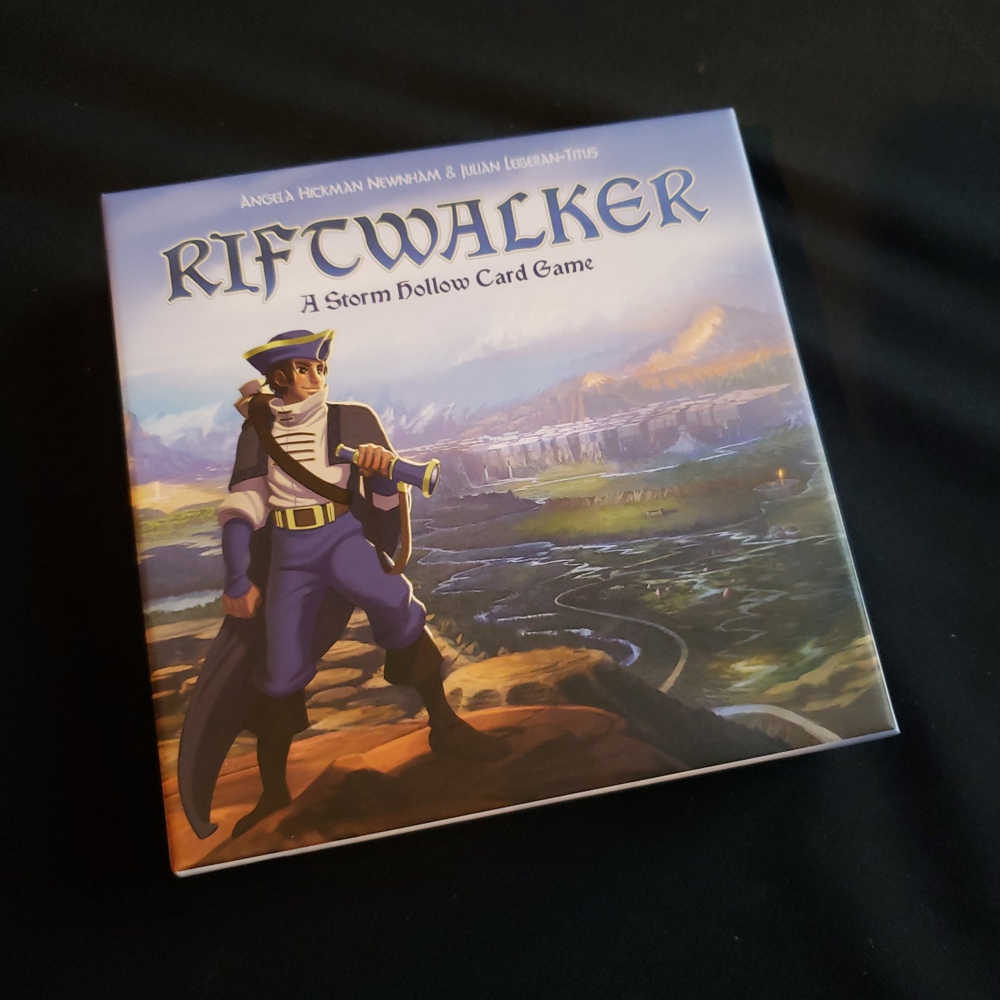 Image shows the front cover of the box of the Riftwalker card game