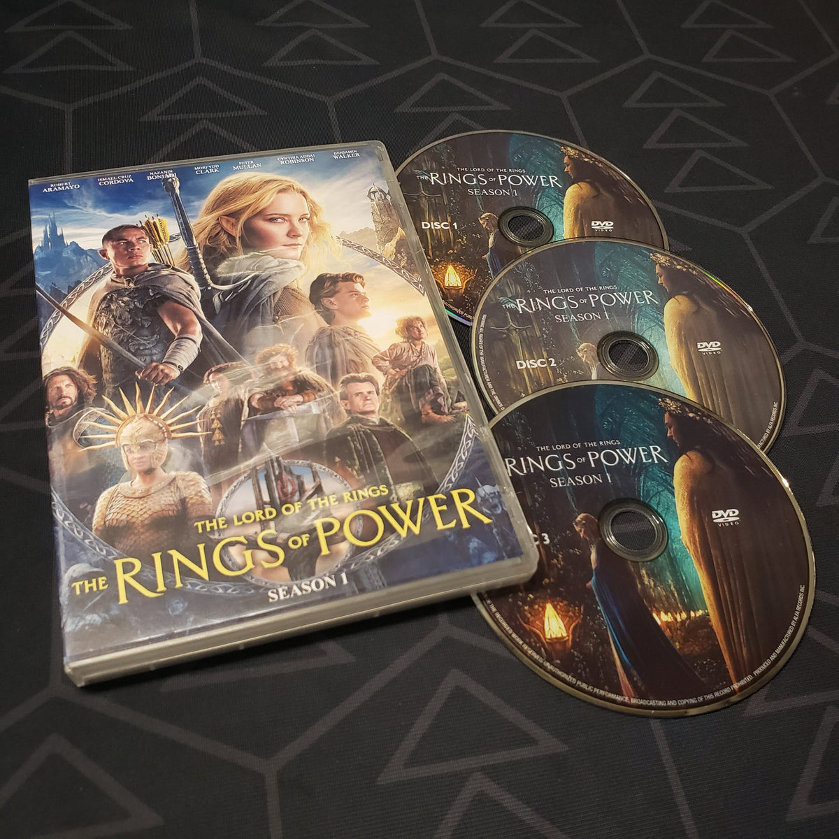 Image shows the case & three discs for the first season of Rings of Power on DVD