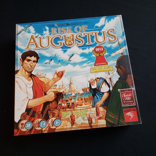 Image shows the front cover of the box of the Rise of Augustus board game