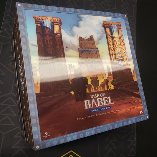 Image shows the front cover of the Legendary Box edition for the board game Rise of Babel