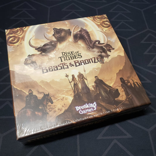 Image shows the front cover of the box of the Beasts & Bronze expansion for the board game Rise of Tribes