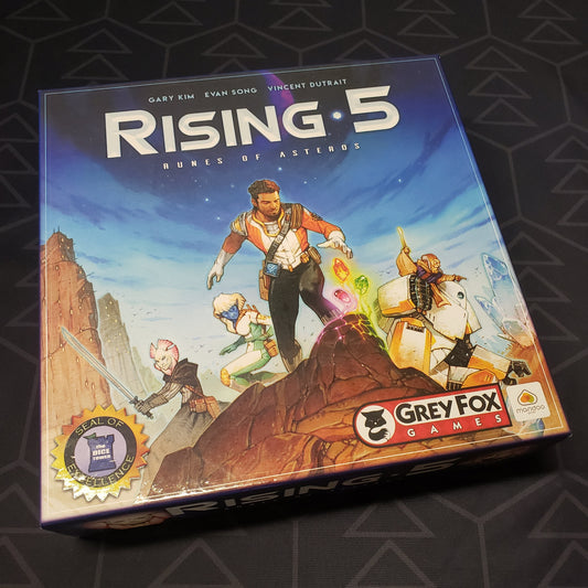 Image shows the front cover of the box for the Rising 5: Runes of Asteros board game