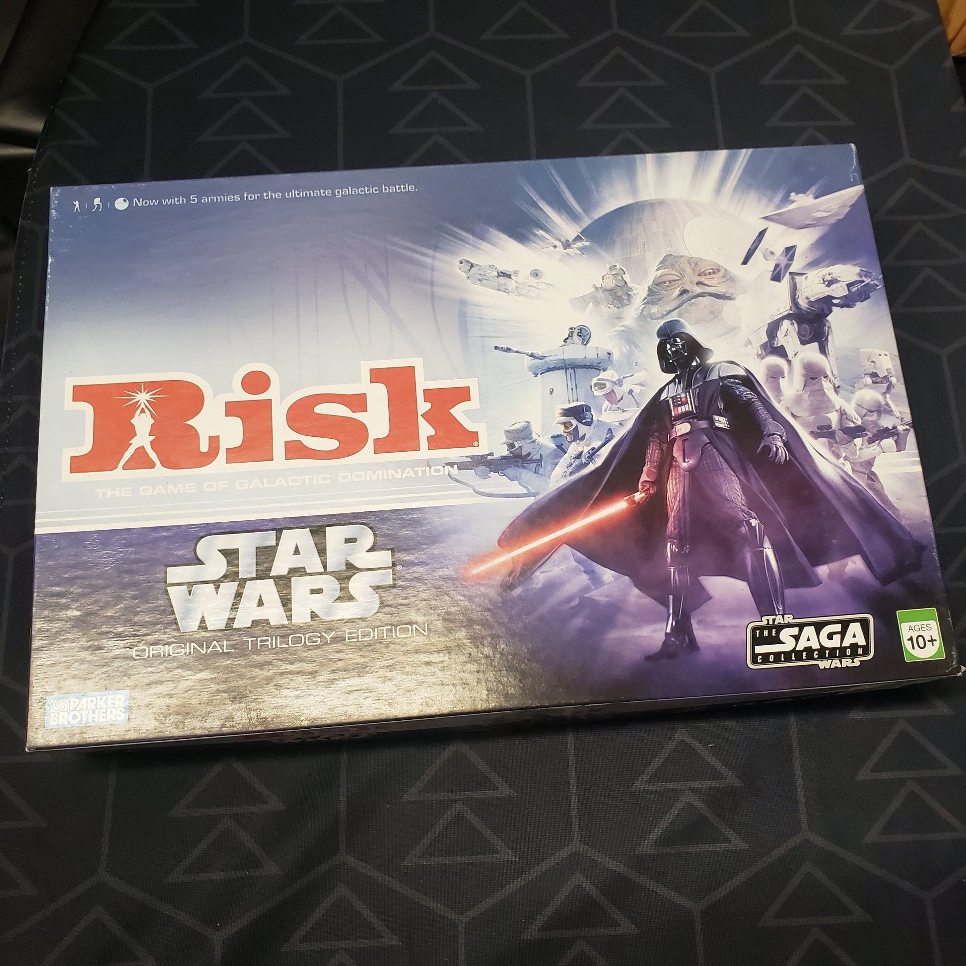 Image shows the front cover of the box for the Risk: Star Wars - Original Trilogy Edition board game