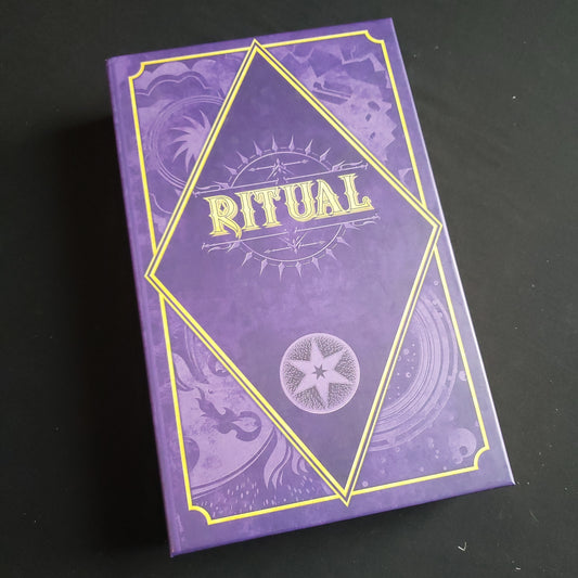 Image shows the front cover of the box of the Ritual board game