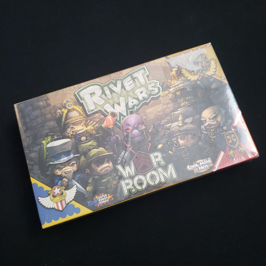 Image shows the front cover of the box of the War Room expansion for the board game Rivet Wars