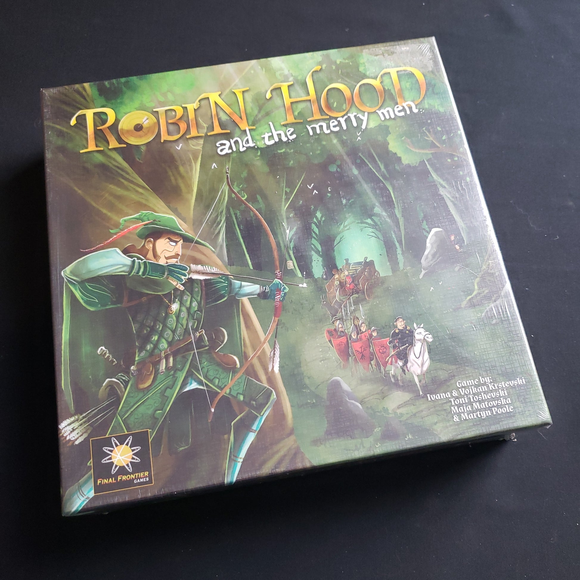 Image shows the front cover of the box of the Robin Hood and the Merry Men board game