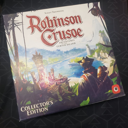 Image shows the front cover of the Collector's Edition box for the board game Robinson Crusoe: Adventures on the Cursed Island